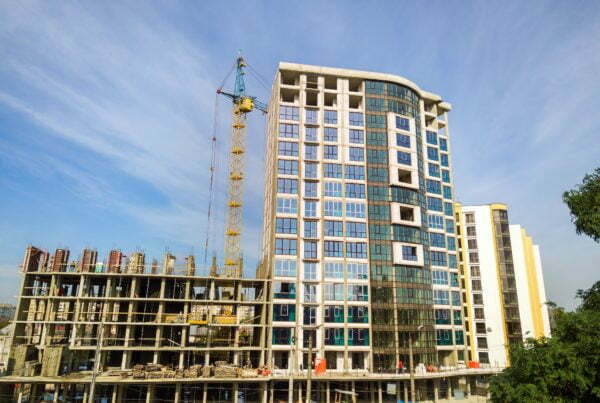 High residential apartment building under construction. Real estate development